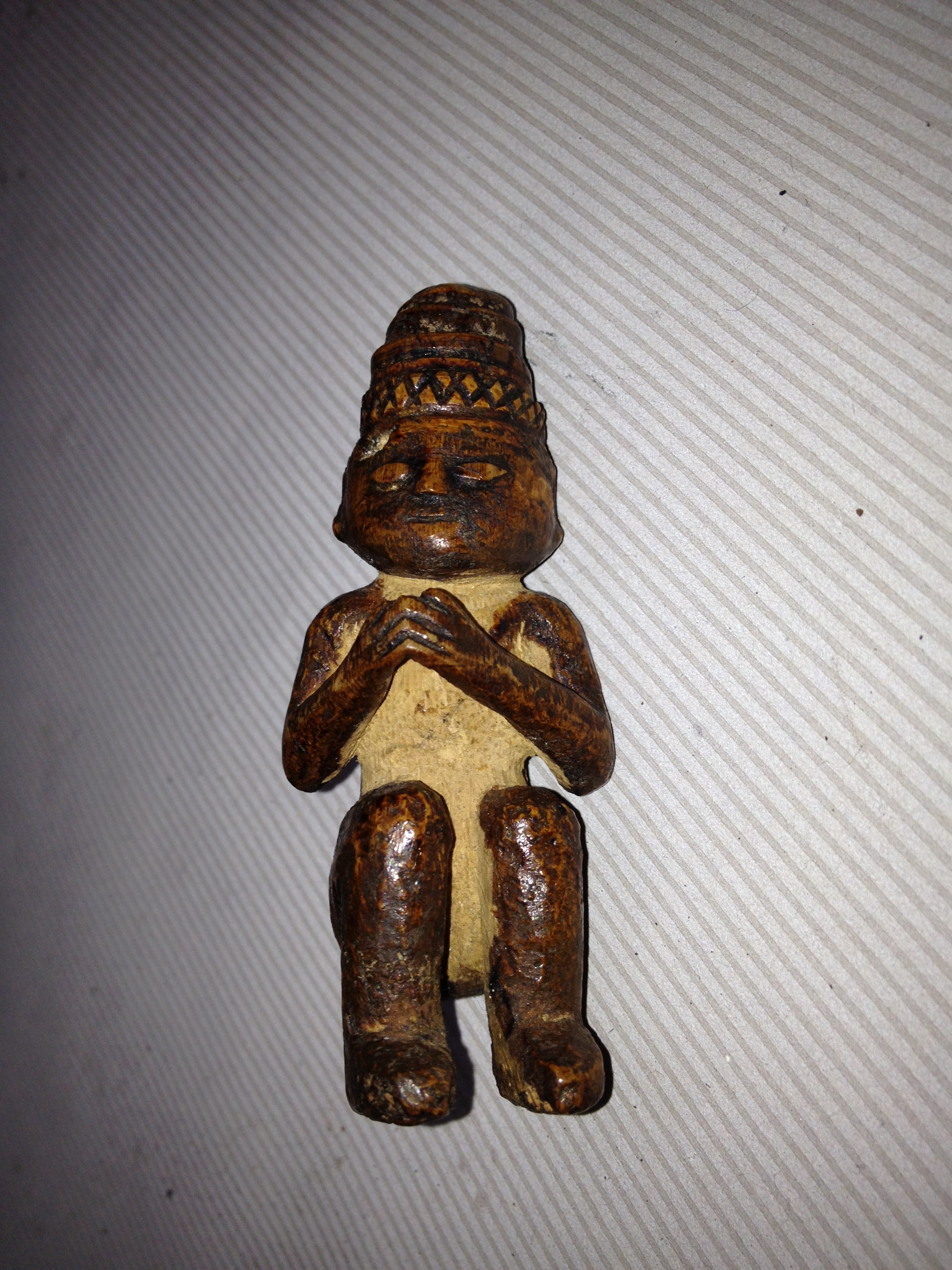 Seated Timor Figure